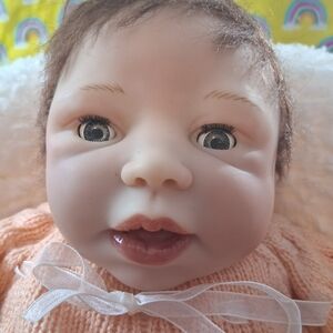One Of The Twins By Ashton And Drake Lifelike Baby Doll with Peach Outfit